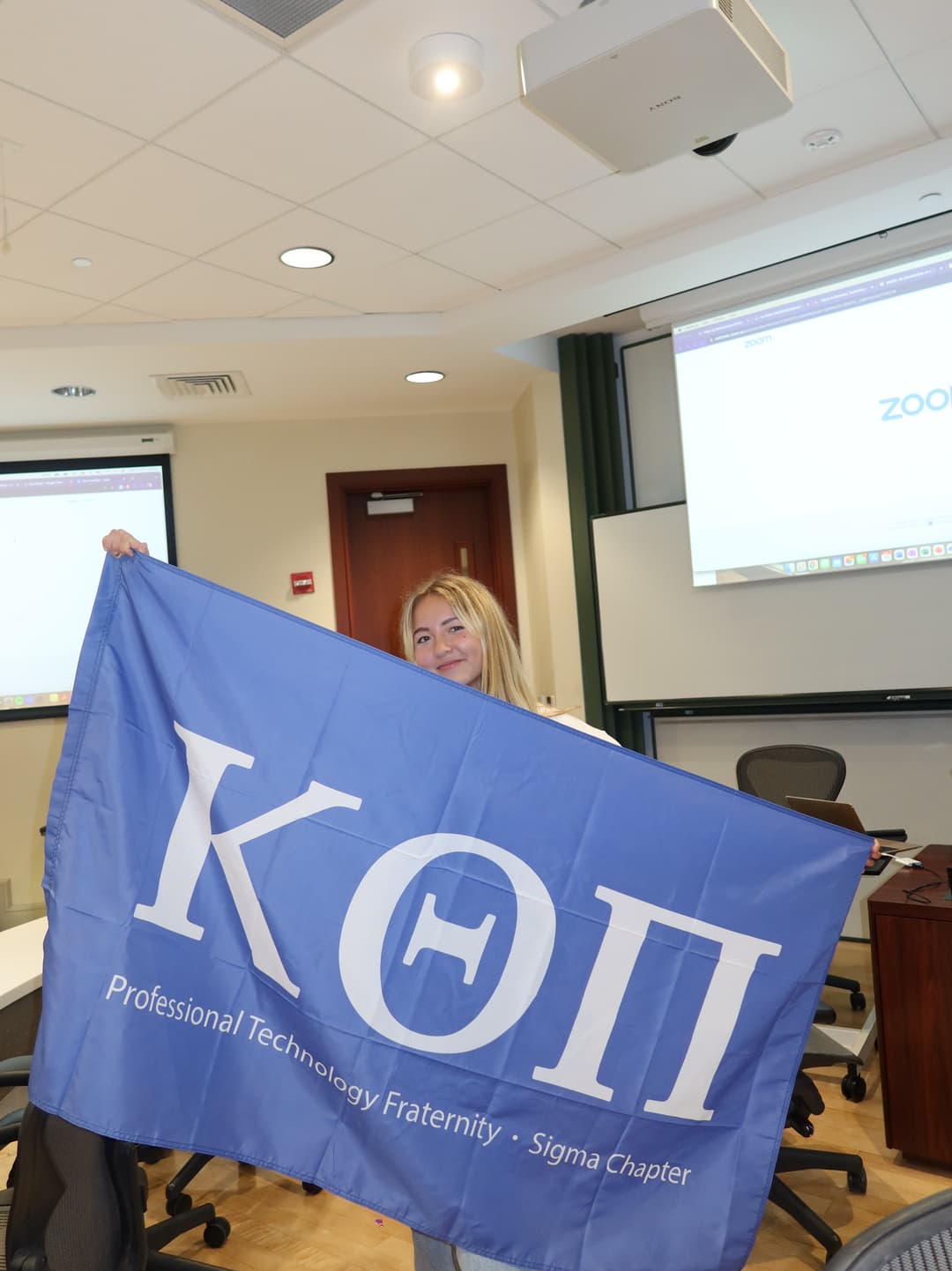 Sophia holding the flag